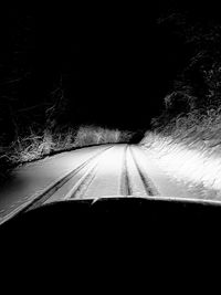 Road seen through car windshield