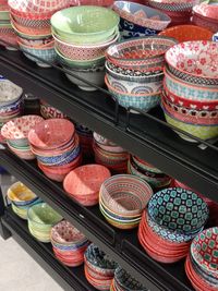 High angle view of multi colored bowls for sale in market