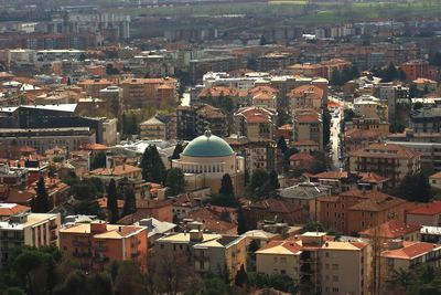 High angle view of illuminated buildings in town