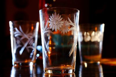 Close-up of beer glass on table