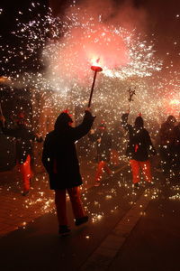 Correfoc parties, typical with firecrackers and lights in the towns