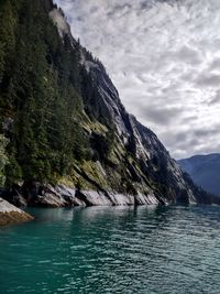 Scenic view of sea against mountain