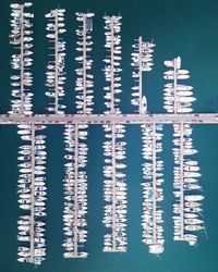 High angle view of boats moored at harbor