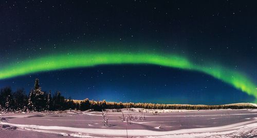 Scenic view of landscape against sky at night