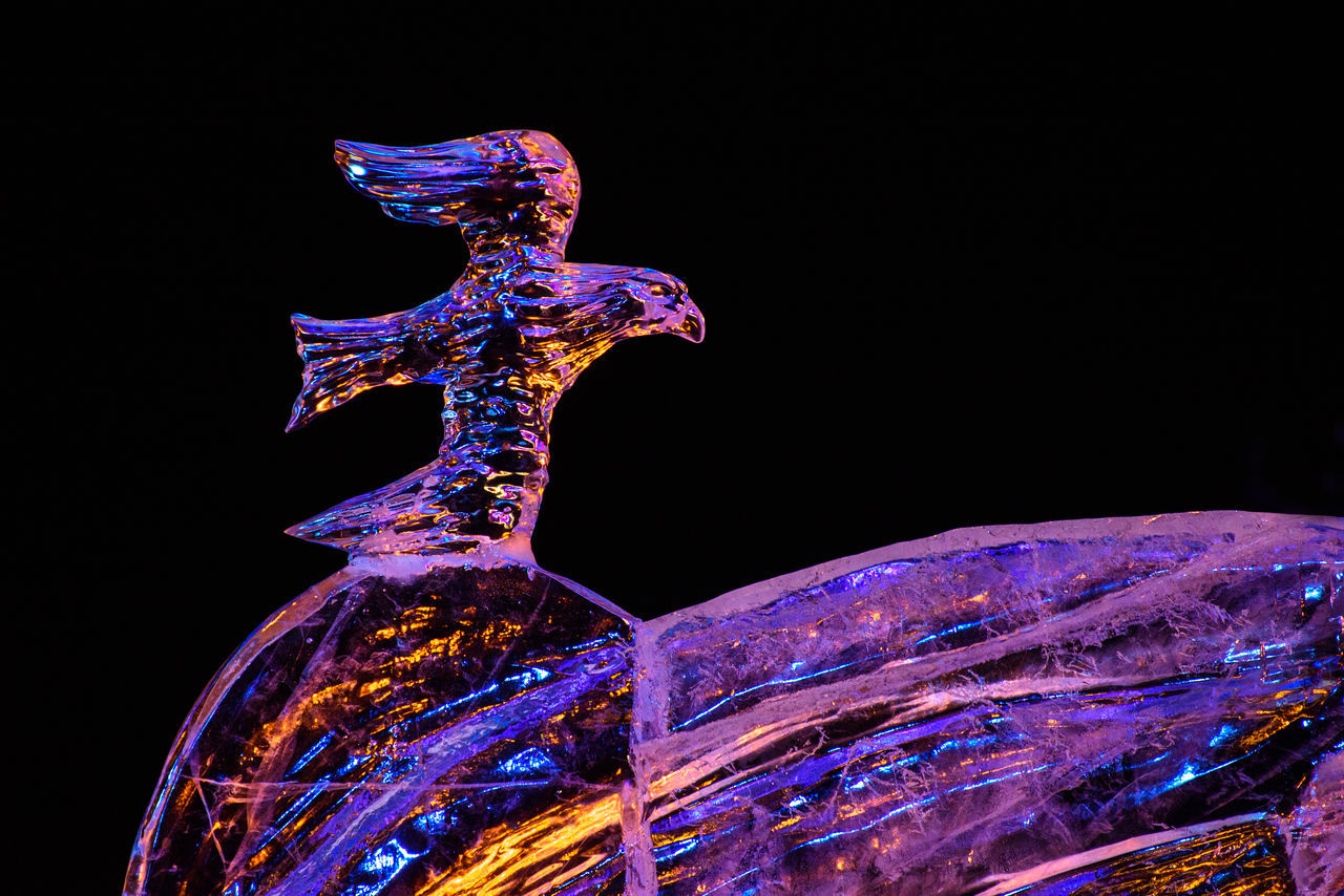 black background, no people, night, illuminated, studio shot, statue, art