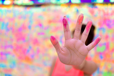 Close-up of painted woman fingers