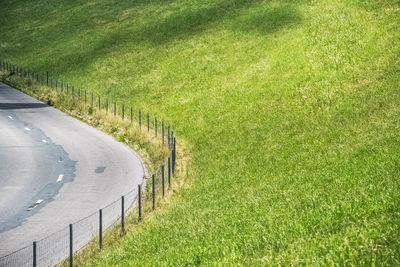 High angle view of road amidst field