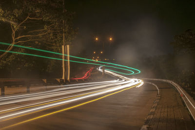 Light trails on road at night