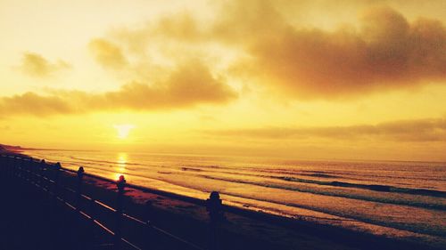 Scenic view of sea at sunset