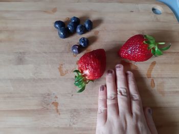 High angle view of strawberries on table