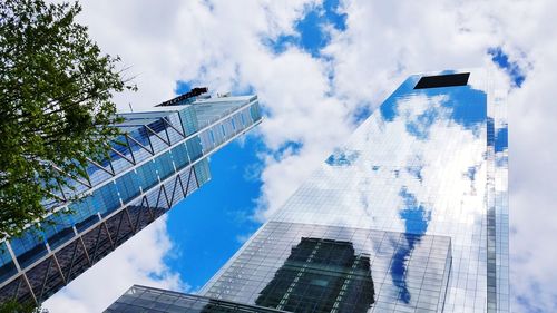 Low angle view of modern buildings against sky