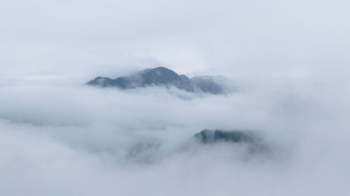 Scenic view of majestic mountains against sky