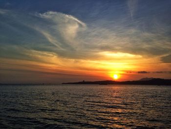 Scenic view of sea at sunset