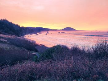 Scenic view of sea against sky during sunset