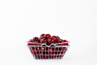 Close-up of fruits against white background