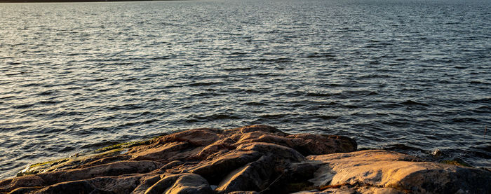 High angle view of rocks on sea