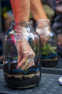 Close-up of hand holding drink