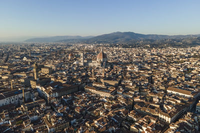 Aerial view of florence along the arno river and the old town from above, tuscany, italy,