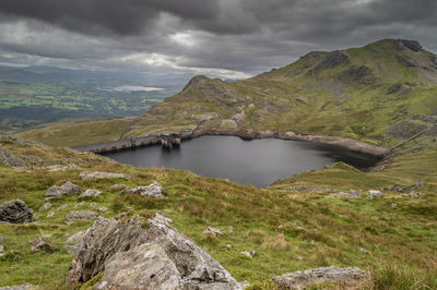 Stwlan dam and the moelwyn mountains near blaenau ffestiniog in snowdonia.