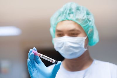 Close-up of doctor holding blood sample