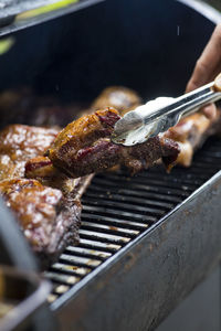 Close-up of meat on barbecue grill