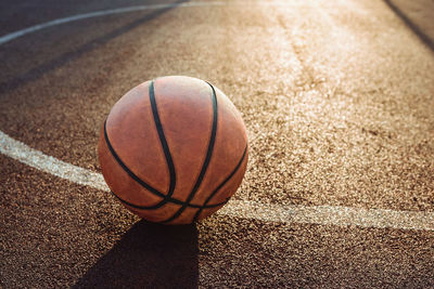 Basketball ball on urban court. sport, recreation concept.