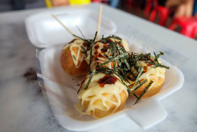 Close-up of served food in plate