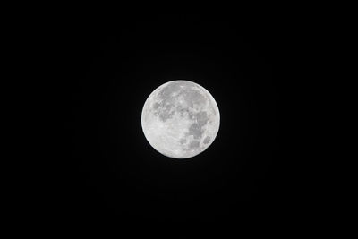 Low angle view of full moon in sky