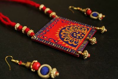 High angle view of jewelry on table