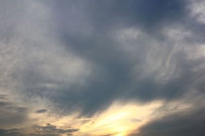 Low angle view of cloudy sky during sunset