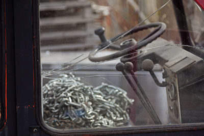 Broken window to a cab for a forklift