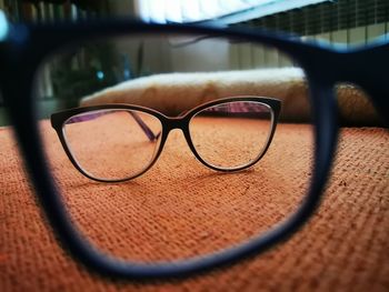 Close-up of sunglasses on table