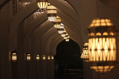 Interior of illuminated building at night