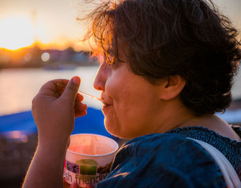 Close-up portrait of boy eating food