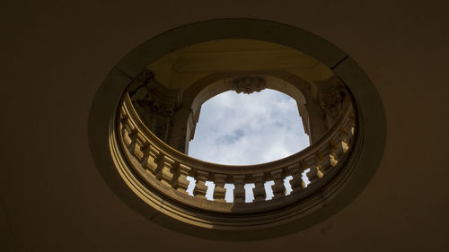 Low angle view of spiral staircase in building
