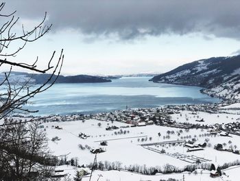 Scenic view of sea against sky during winter