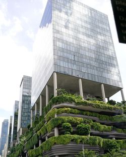 Low angle view of modern buildings against sky