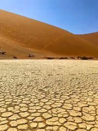 Scenic view of desert against sky