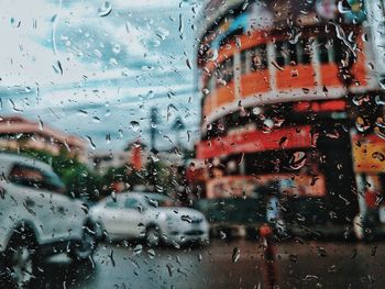 Wet glass window in rainy season