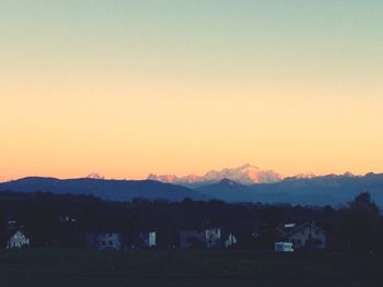 Scenic view of mountains at sunset