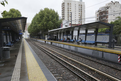 Railroad station platform in city