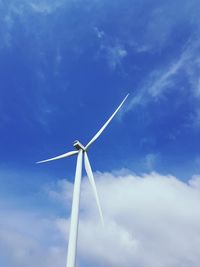 Low angle view of wind turbine against sky