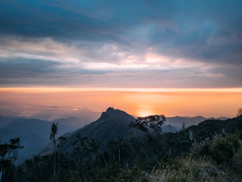 Scenic view of mountains against sky during sunset