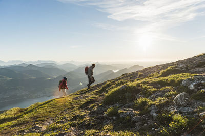 Austria, salzkammergut, couple hiking in the mountains