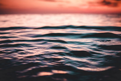 Full frame shot of sea against sky during sunset