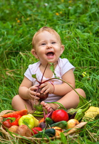 Portrait of cute girl picking apples