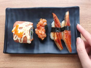 High angle view of meat in plate on table