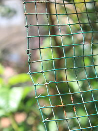 Full frame shot of metal fence against plants