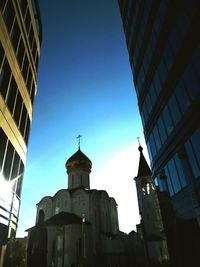 Low angle view of buildings against clear sky