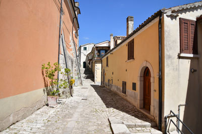 A narrow street of morcone, a medieval village in benevento province, italy.